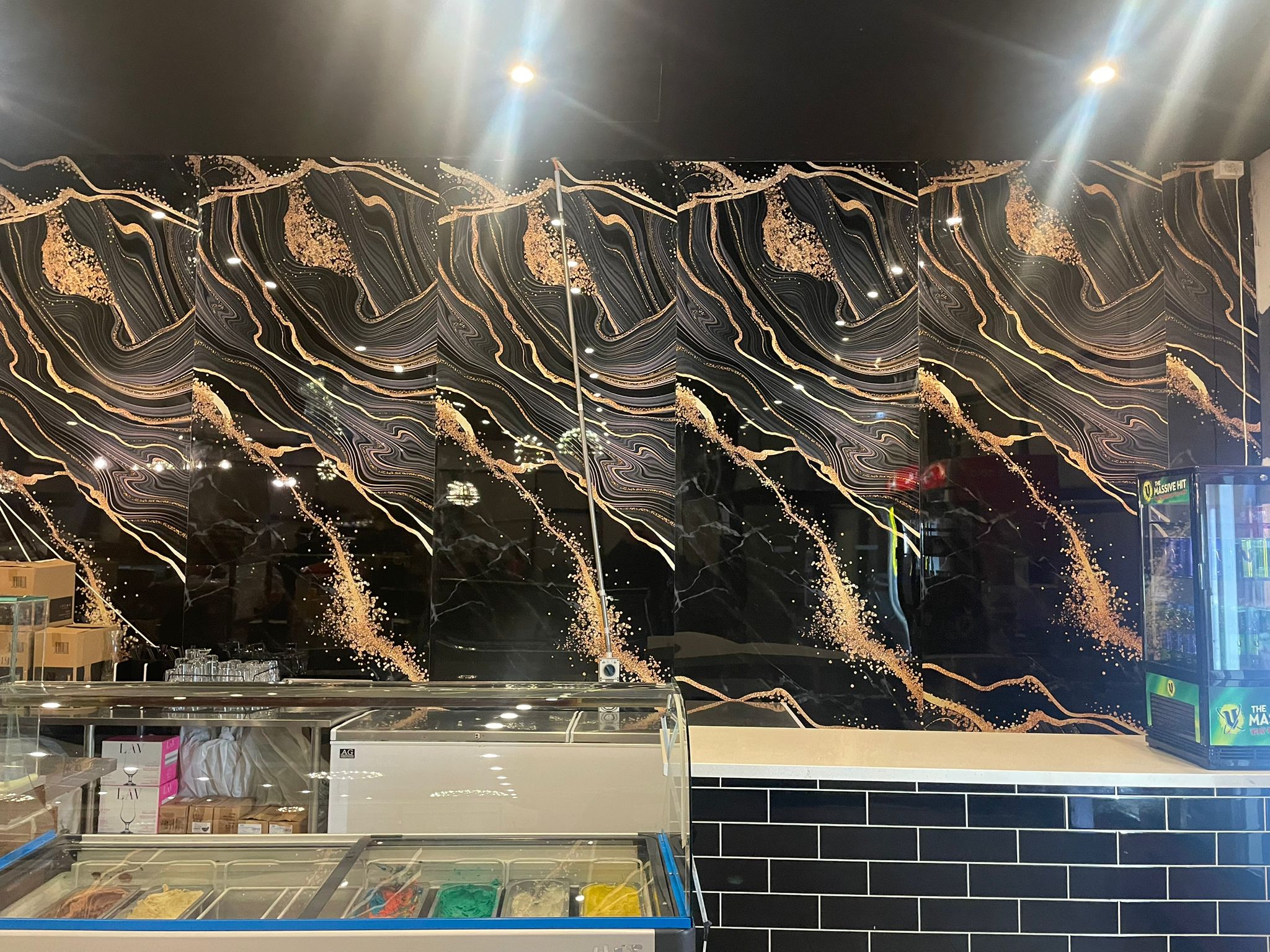 Tiba Lebanese Restaurant | Acoustic brown cladding and Black & Gold UV Panel